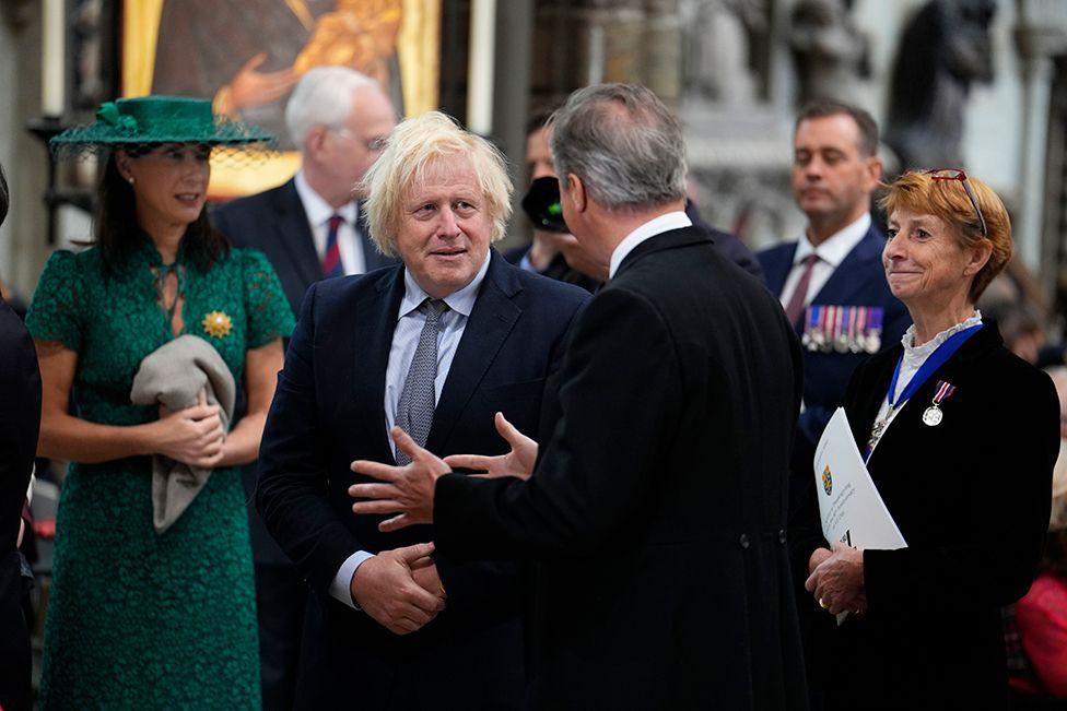 Former Conservative Party prime ministers Boris Johnson and Lord David Cameron attend a service of thanksgiving at Westminster Abbey in London on the 80th anniversary of VE Day.
