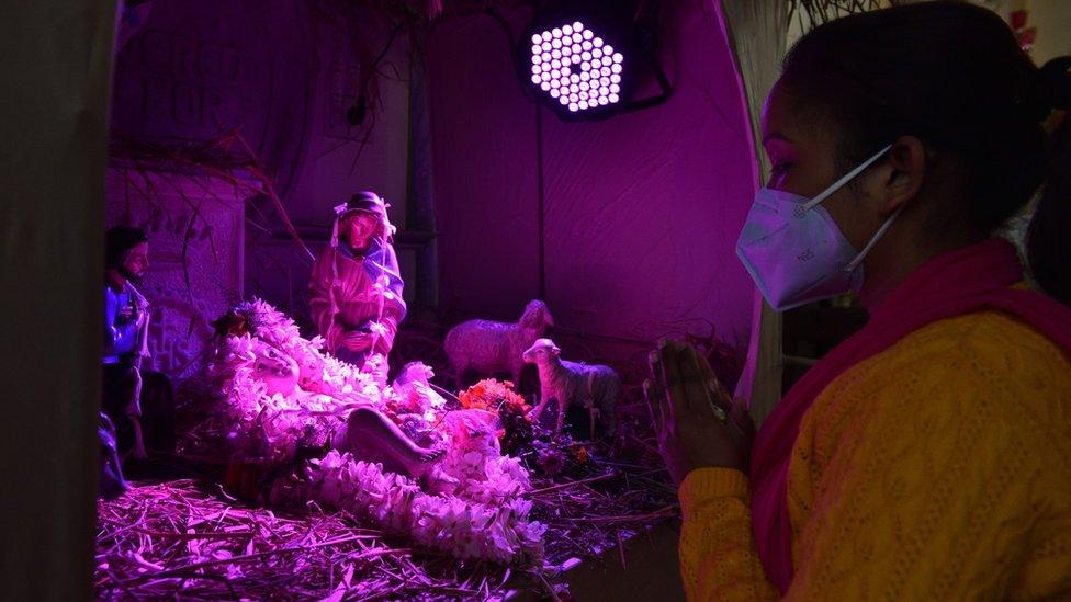 People during the Christmas Mass, in Kolkata, India, on December 25, 2020 amid the Covid-19 pandemic.