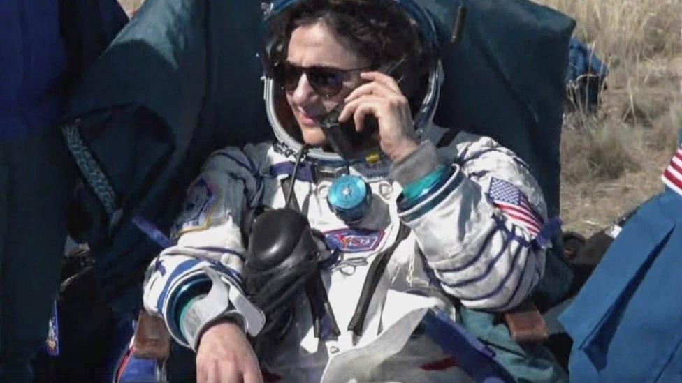 Nasa astronaut Jessica Meir uses a phone shortly after the Soyuz MS-15 spacecraft landed near the city of Zhezkazgan, Kazakhstan, 17 April 2020