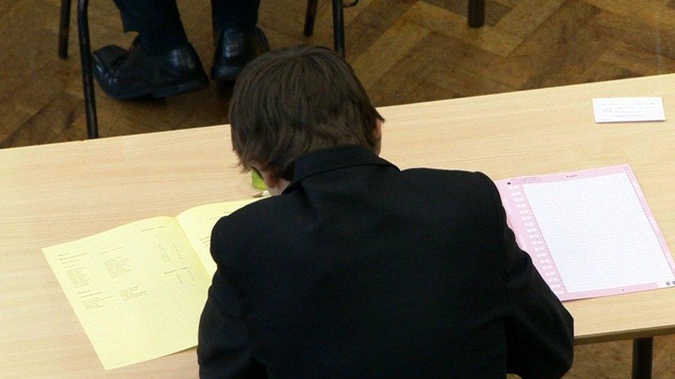 The report said it was unacceptable that boys continue to under-perform in exams, when compared to girls