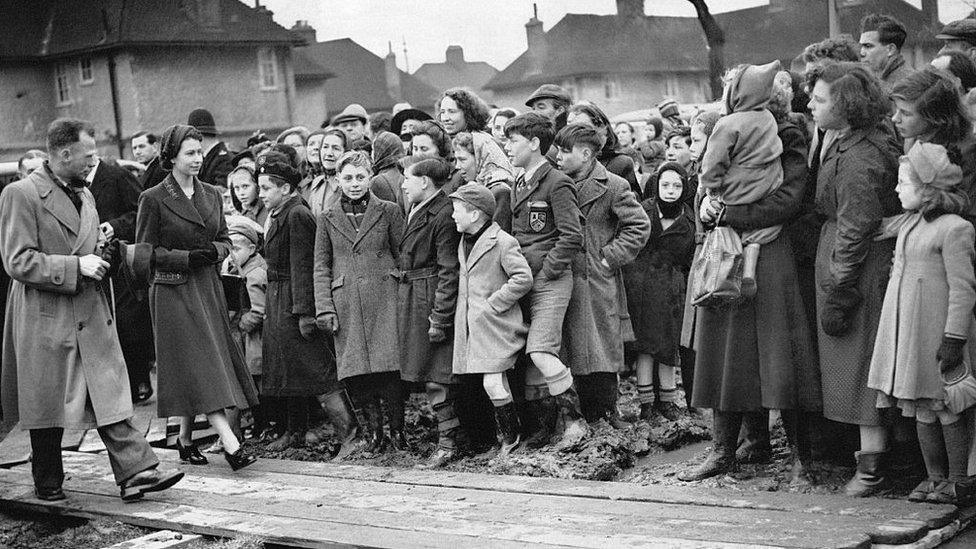 Queen Elizabeth II visits Tilbury in February 1953, following flooding in the area