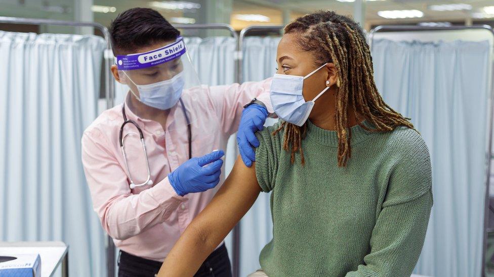 Doctor giving vaccine