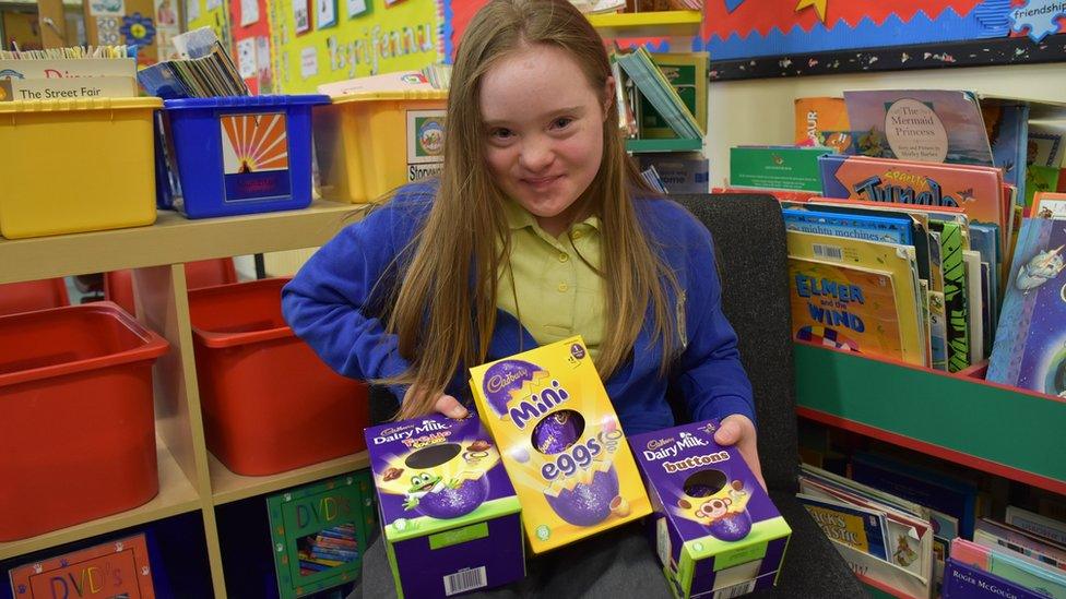 Hollie Evans holding chocolate eggs