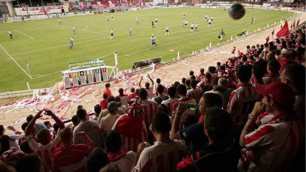 Fans at a Derry City match at the Brandwell Stadium