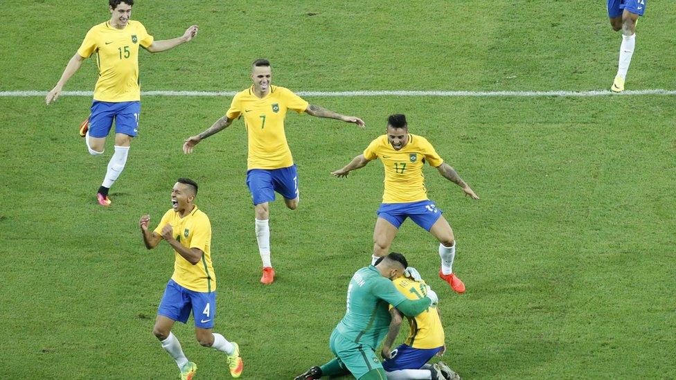 Neymar and his Brazil team-mates celebrate victory in the Olympic football final.