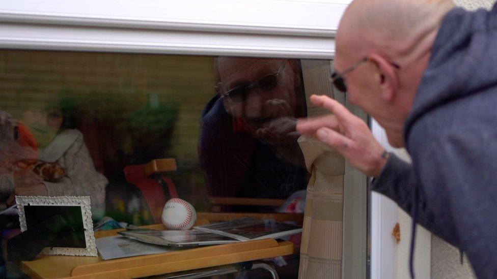 David Capewell greets wife Anthea through care home window