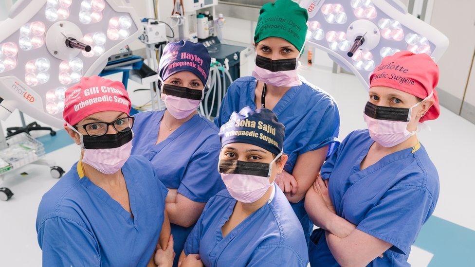 Female surgery staff wearing the scrub caps