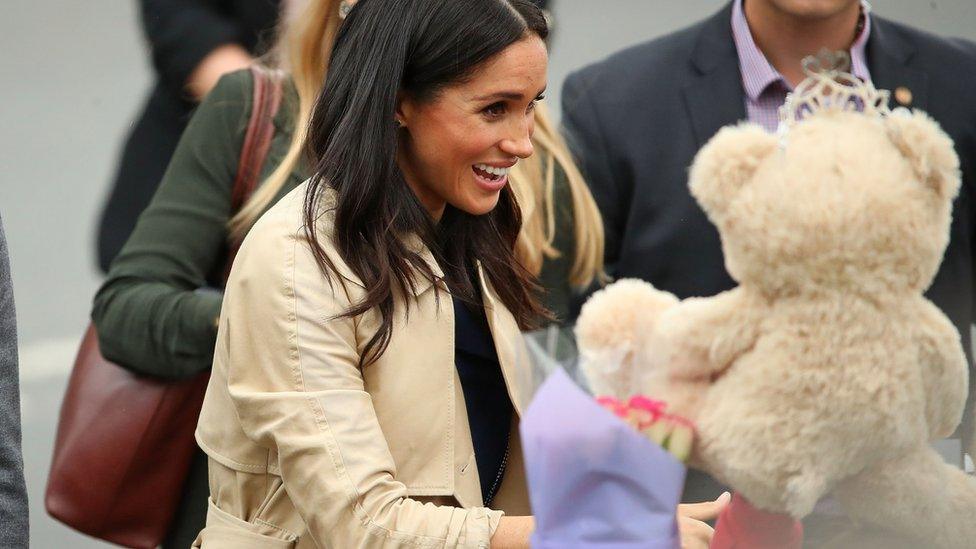 The Duchess of Sussex receiving a Teddy bear