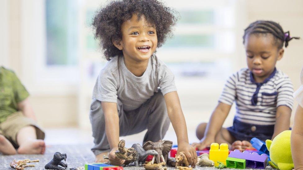 Children playing with toys.