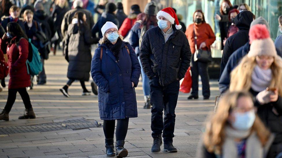 People shopping on Princes Street in Scotland on Saturday 18 December 2021