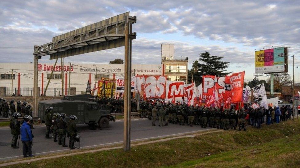 Demonstrators block the Pan-American highway in Buenos Aires on June 25, 2018, during a 24-hour general strike called by Argentina's unions