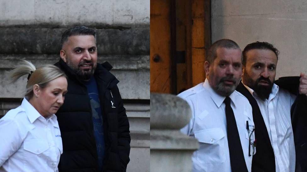 Two men in black jackets are seen with prison officers