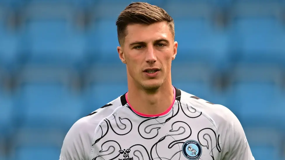 Wycombe Wanderers goalkeeper Stuart Moore signs contract extension with the League One club