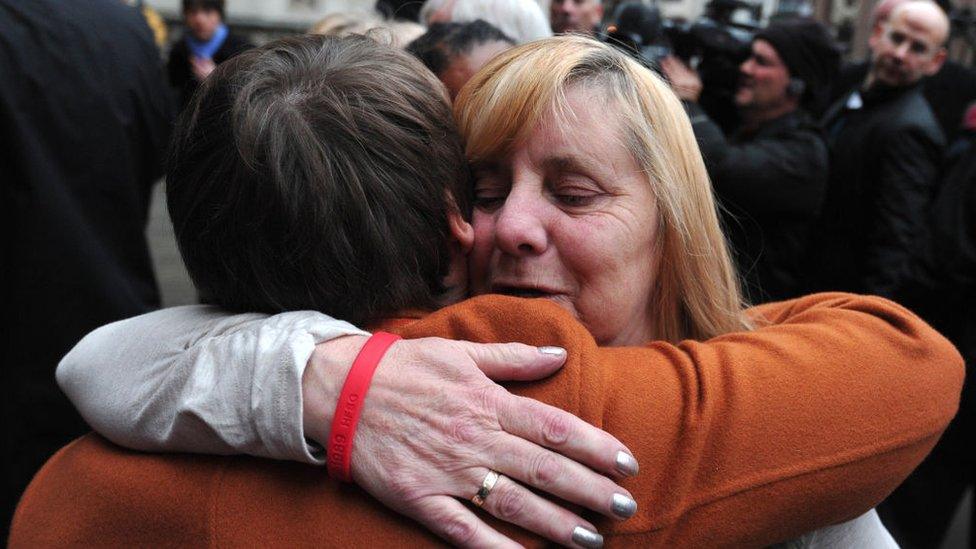 Margaret Aspinall, who lost her son James in the Hillsborough disaster, is comforted outside the High Court in London in December 2012 after the original accidental death verdicts returned on Liverpool football fans were quashed