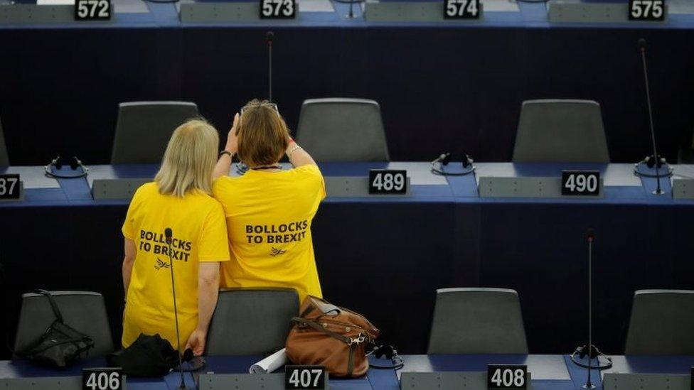 Lib Dem MEPs wearing yellow anti-Brexit T-shirts in European parliament