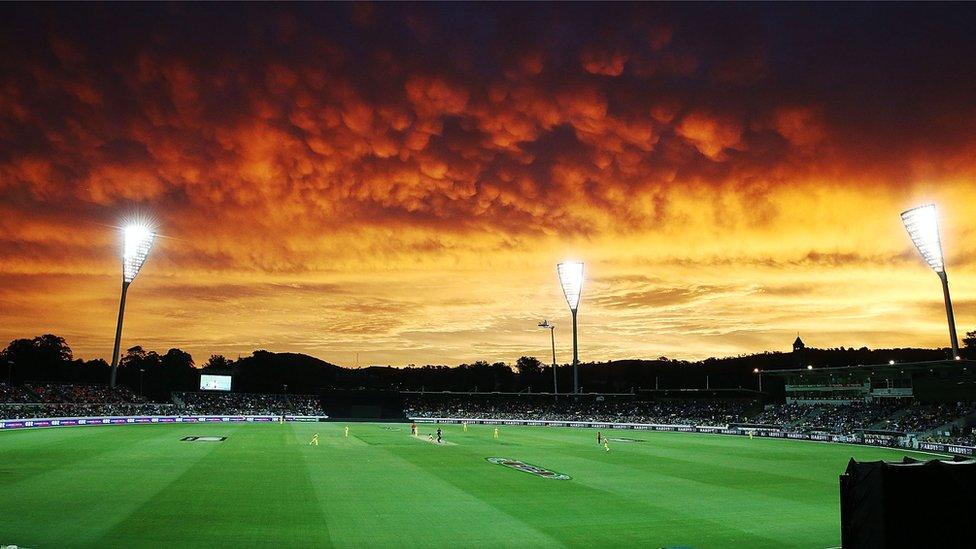 The sunset cast brilliant shades of orange over Canberra's Manuka Oval.