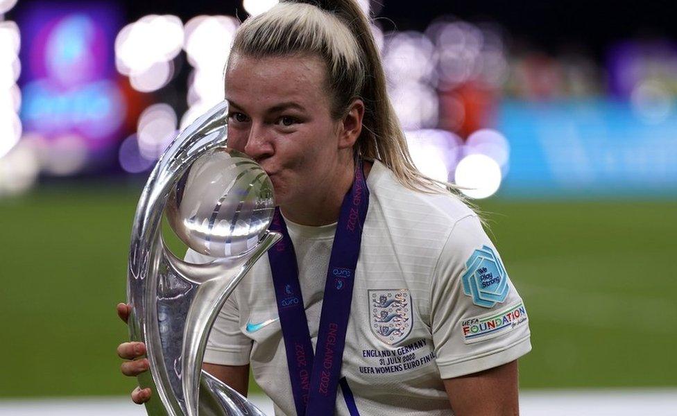 England's Lauren Hemp celebrates with the trophy following victory over Germany in the UEFA Women's Euro 2022 final at Wembley Stadium, London