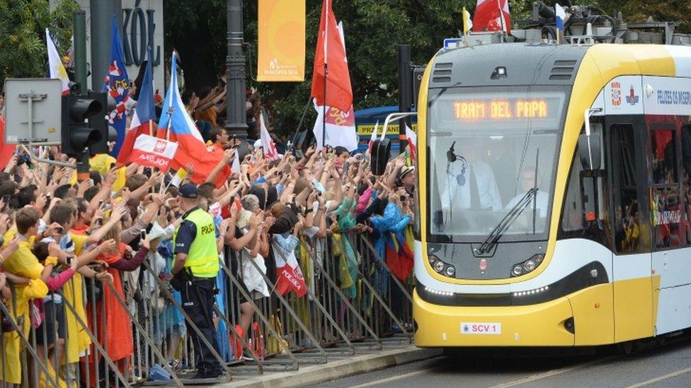 Pope Francis rides a tram in Krakow, Poland