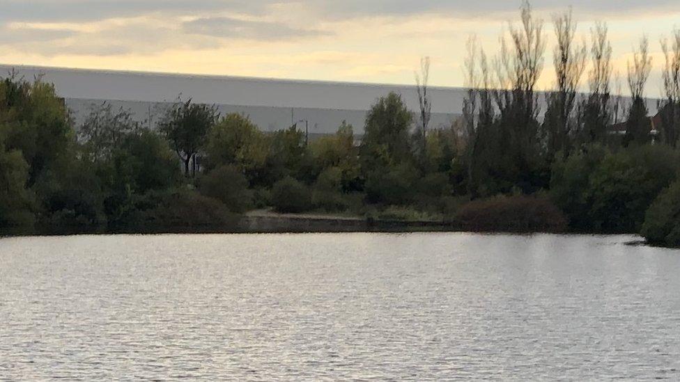 The warehouse looks over Tongwell Lake