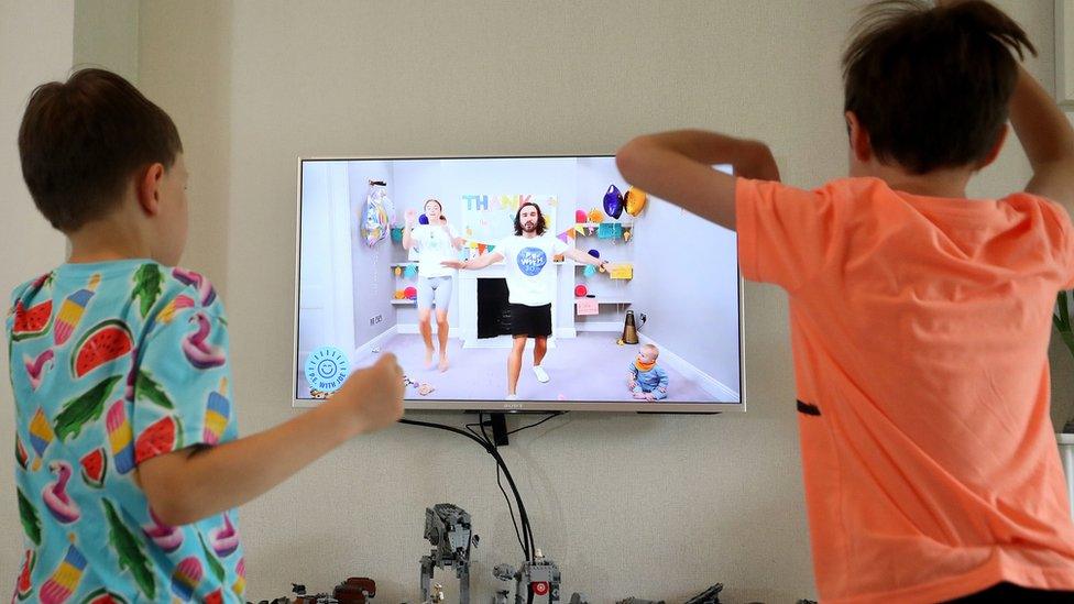 Ben and Isaac Rickett take part in the last session of PE with Joe, the online fitness workout by fitness coach Joe Wicks, at their home in Cheshire