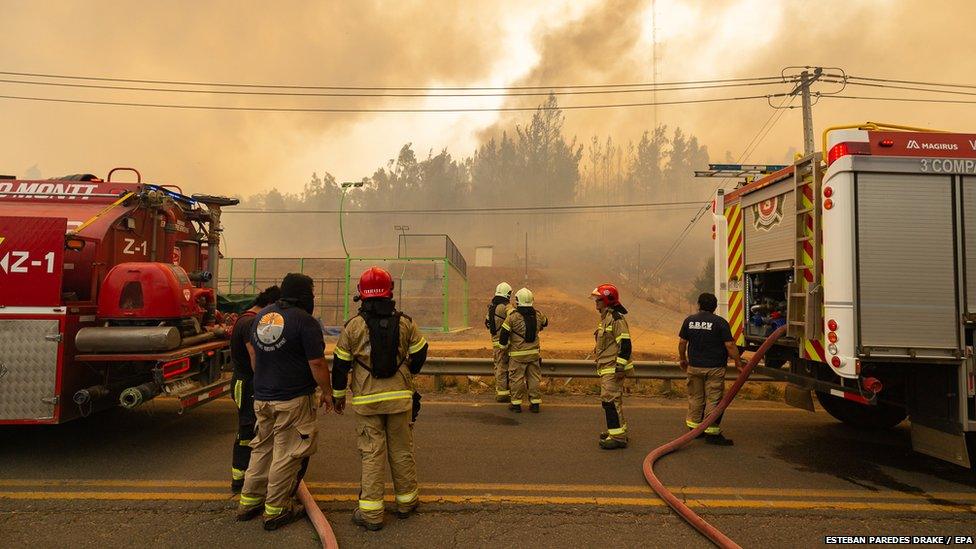 emergency servcies battle wildfires in chile