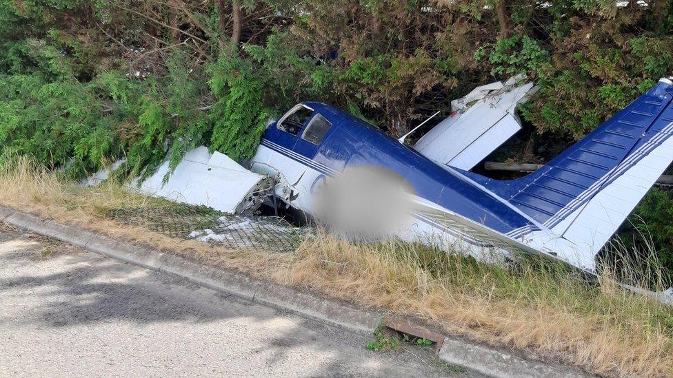 Light aircraft in a ditch after crashing