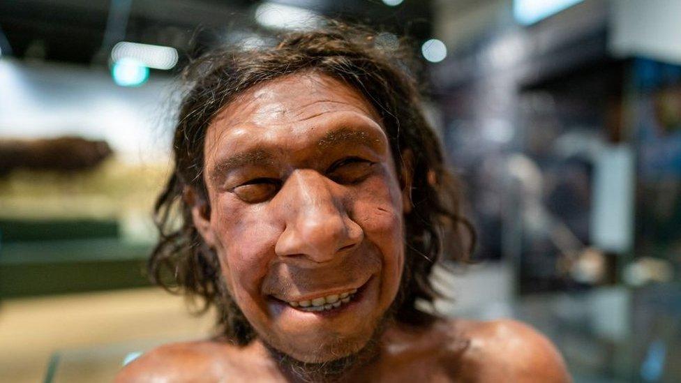 Smiling Neanderthal man