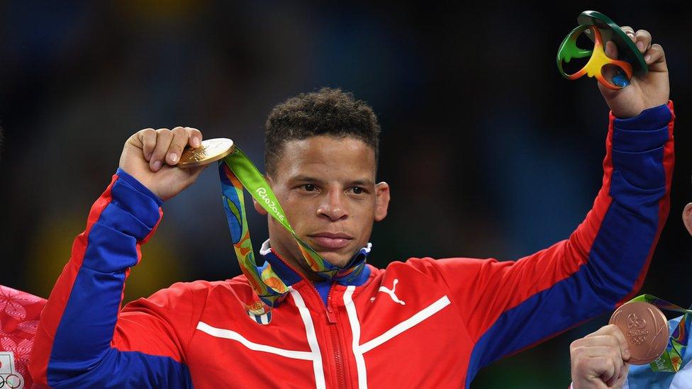 Gold medallist Ismael Borrero Molina of Cuba celebrates on the podium after the Men's Greco-Roman 59 kg competition on Day 9 of the Rio 2016 Olympic Games at Carioca Arena 2 on August 14, 2016 in Rio de Janeiro, Brazil.