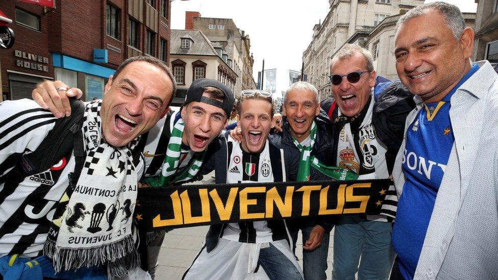 Juventus fans enjoy the atmosphere in Cardiff Bay