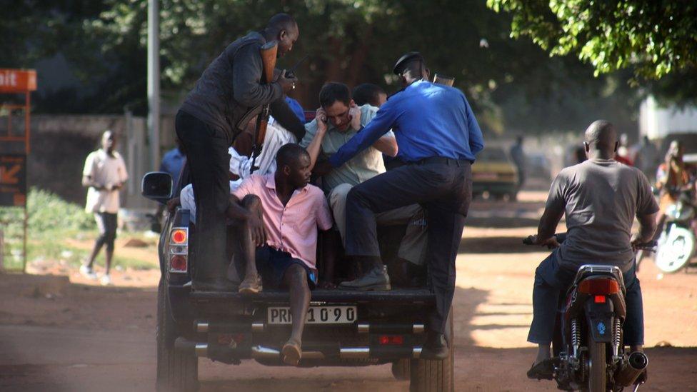 Malian security forces prepare to transport hostages freed from the Radisson Blu hotel in Bamako on November 20, 2015. Gunmen went on a shooting rampage at the luxury hotel in Mali"s capital Bamako, seizing 170 guests and staff in an ongoing hostage-taking that has left at least three people dead.