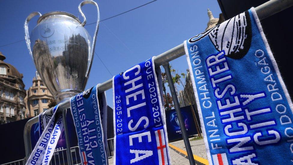 Scarves and a trophy.