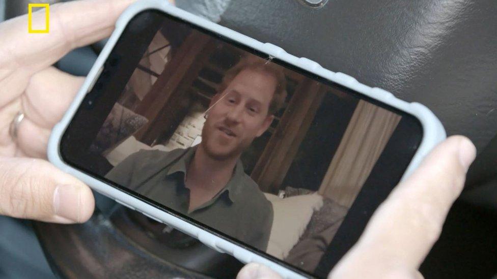 Prince Harry on a mobile phone