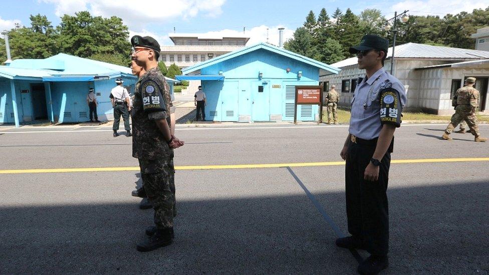 South Korean soldiers stand guard at the border village of Panmunjom in the Demilitarised Zone, South Korea, on 7 September 2018