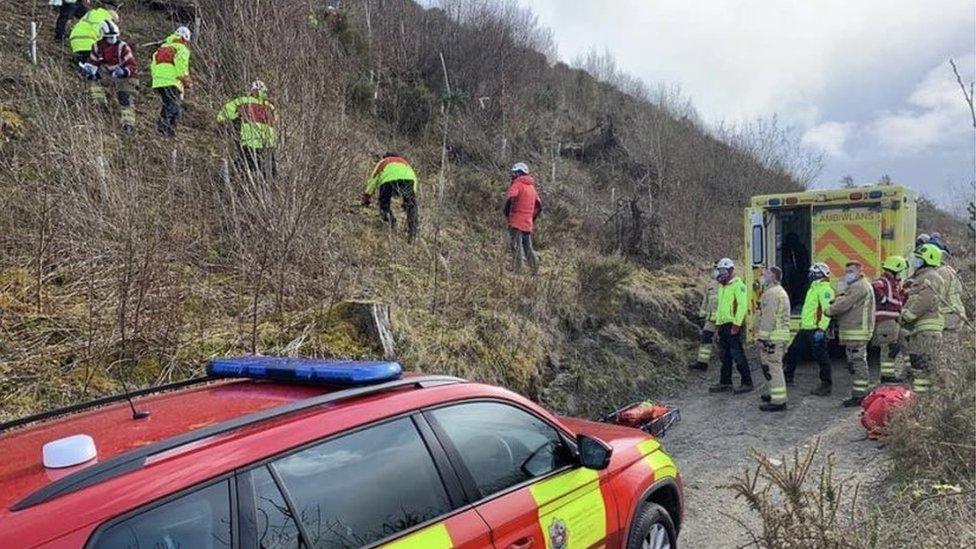 Rescue operation to save paraglider on hillside above Hundred House, Powys