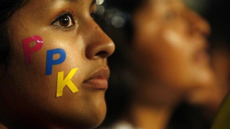 Supporters of Pedro Pablo Kuczynski attend a campaign rally in Lima on April 7, 2011