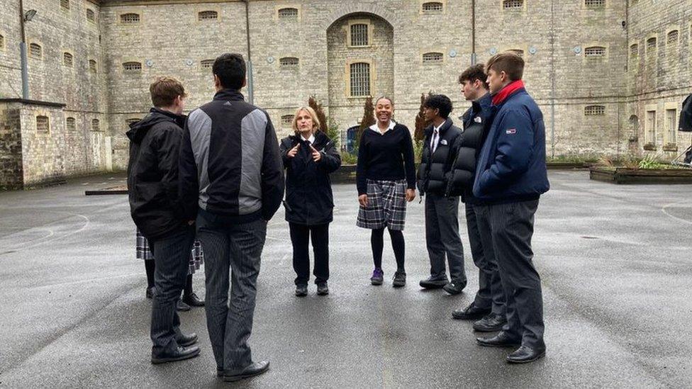 Pupils taking part in session outside Shepton Mallet prison.