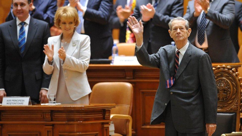 King Michael I of Romania (R) receives applause after his anniversary speech next to Princess Margaret (2ndL) and consort Prince Radu Duda (L) at Romanian Parliament in Bucharest October 25, 2011