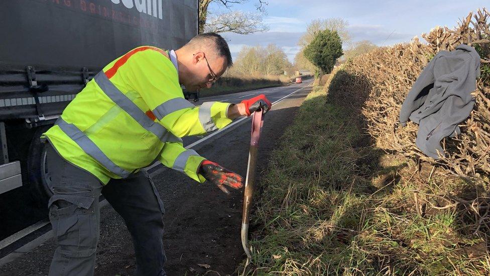 Jozsef Vass working on the pavement