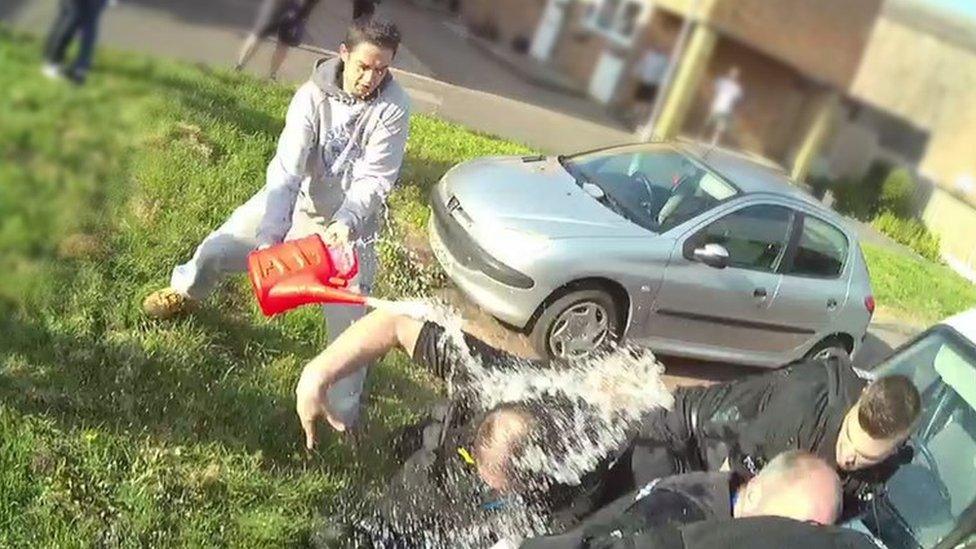 Essex Police officers doused in petrol