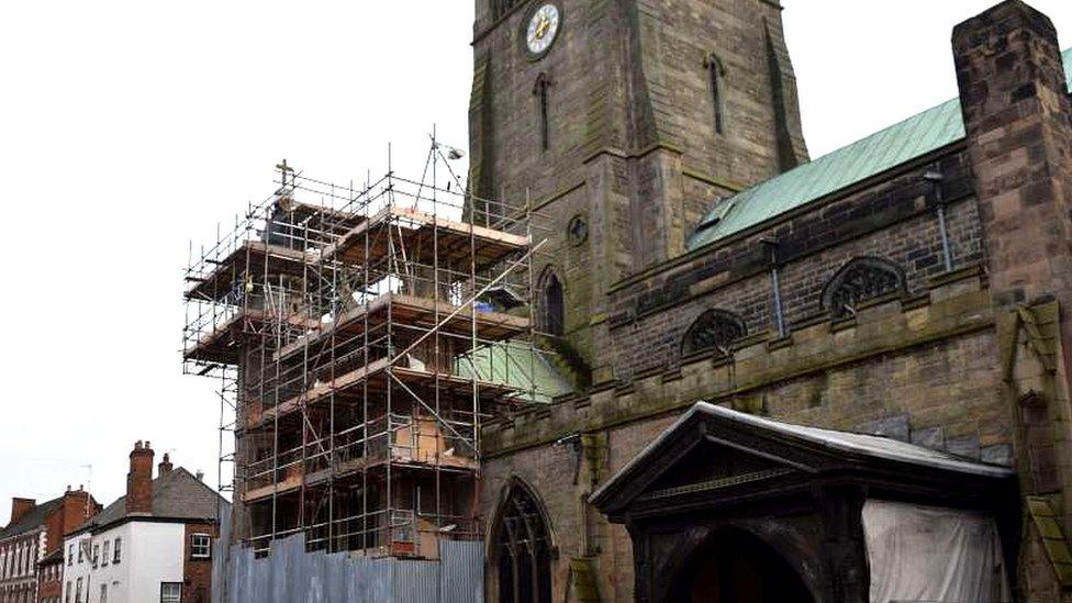 The new cross on the north transept of the Leicester Cathedral