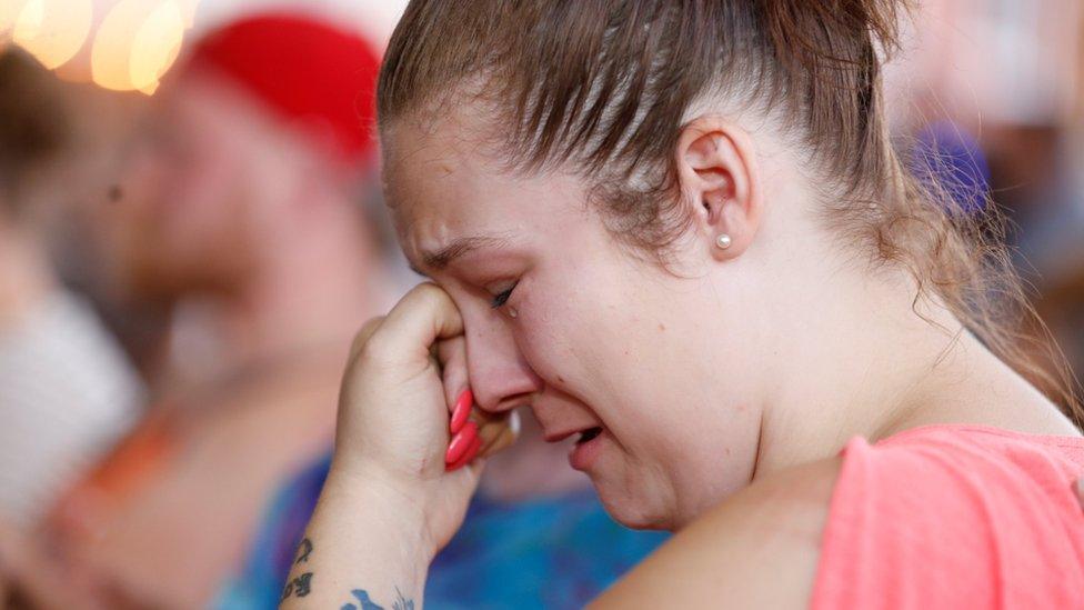 Lower Lake resident Andrea McMullen cries during a community meeting at the evacuation centre in Middletown for residents displaced by the Clayton Fire at Lower Lake in California, U.S. August 15, 2016