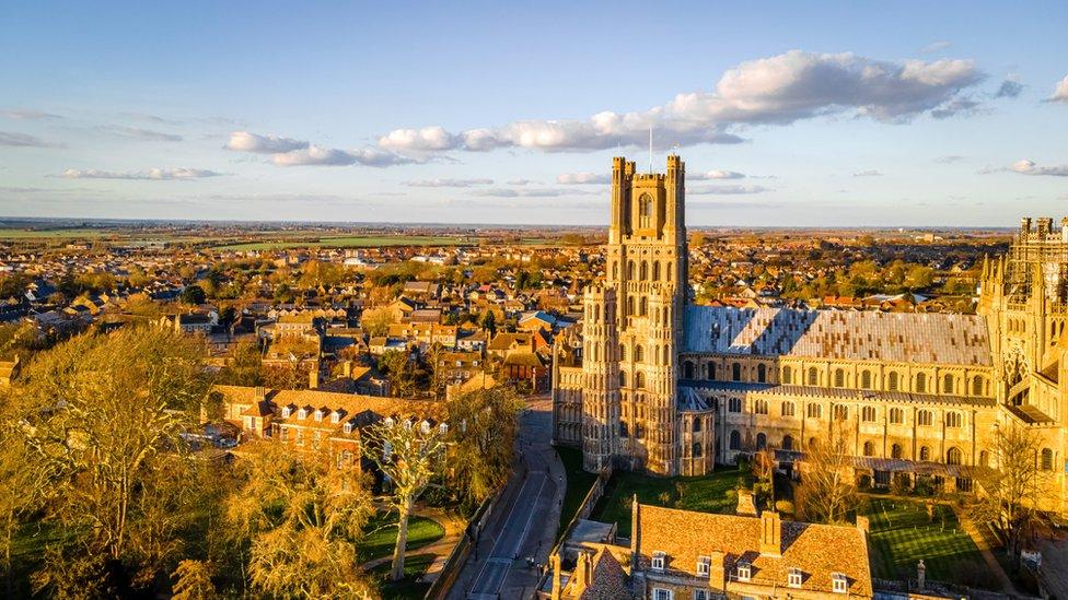 Raised view over Ely Cathedral and the city beyond