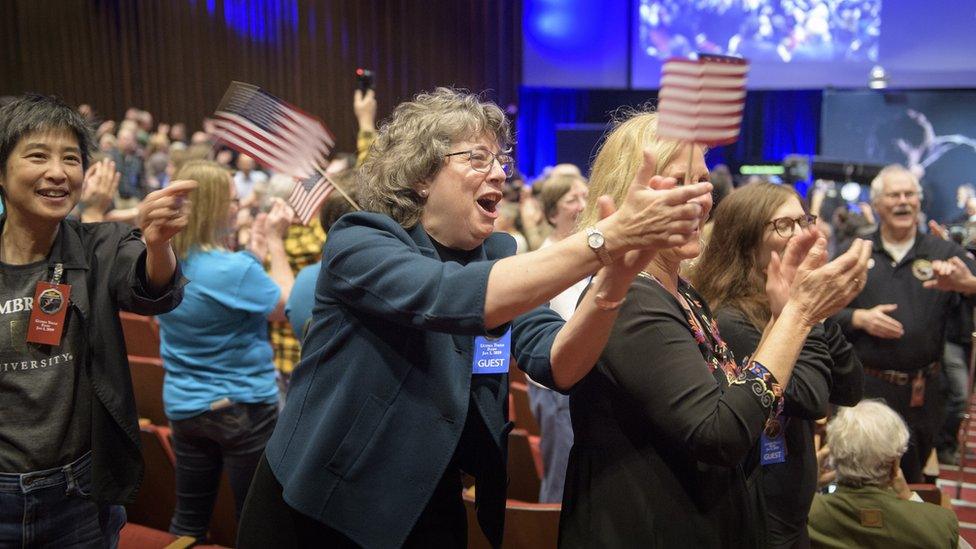 Guests celebrate as the news comes in