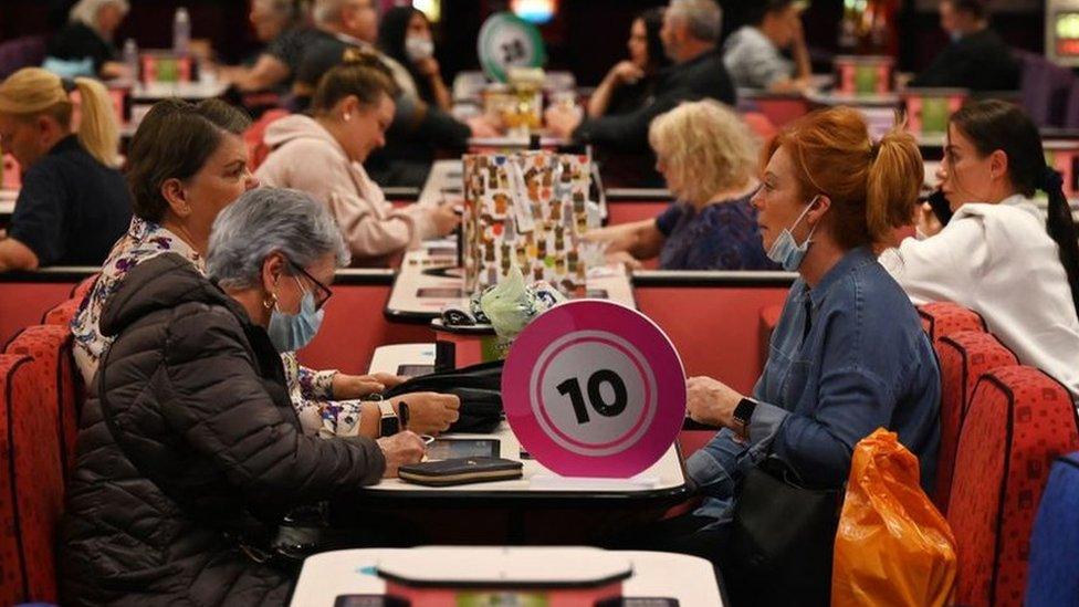 People playing bingo in Mecca bingo hall on 17 May 2021