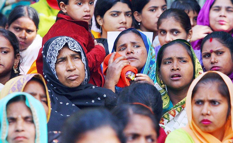 Indian Dalit (Oppressed) Christian and Muslim women listen to leaders during a rally against the National Commission for Scheduled Castes and Scheduled Tribes for its recent rejection of the demand for reservation for Dalit Christians and Muslims, in New Delhi, 03 March 2007. Thousands of protestors, church leaders, nuns and activists of the National United Christian Forum demanded the United Progressive Alliance Government equal rights and reservation for the Dalit Christians and Muslims