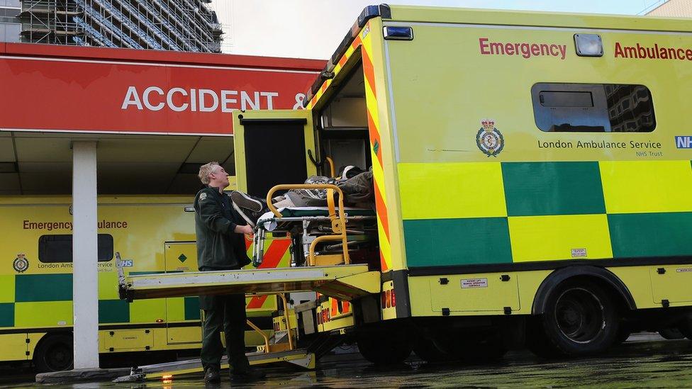 Patient wheeled out of a stretcher from an ambulance