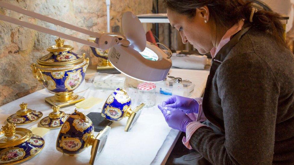 Specialists at work in the conservation studio.