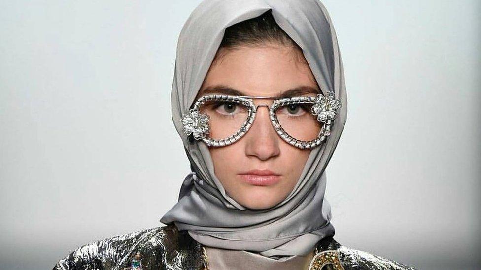 A model wears a hijab as part of the Anniesa Hasibuan collection at New York Fashion Week 2016