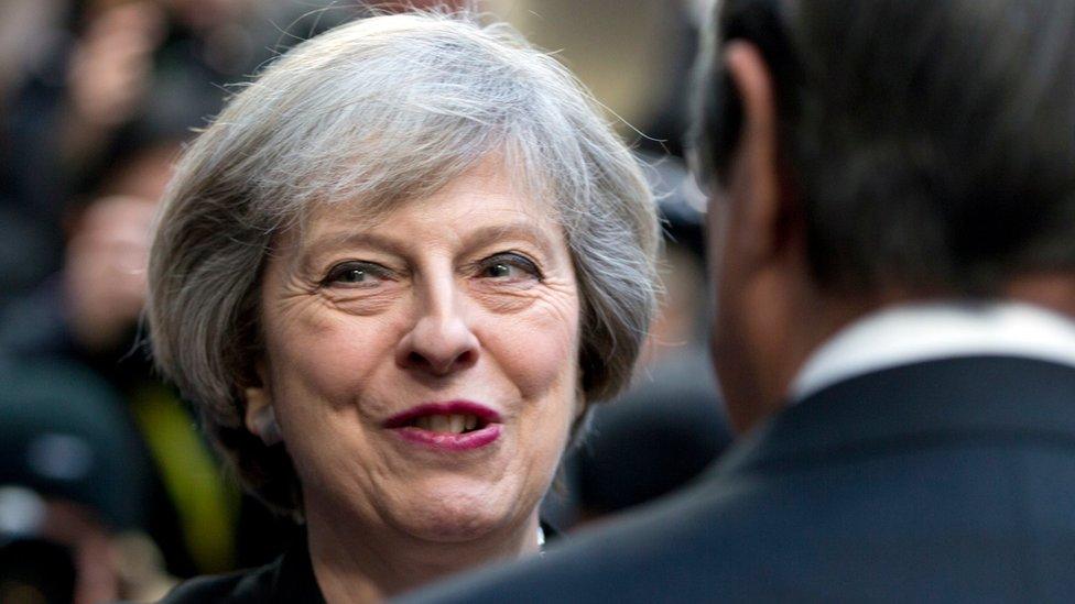 British Prime Minister Theresa May, left, stops to speak with Cypriot President Nicos Anastasiades as she arrives for an EU Summit in Brussels