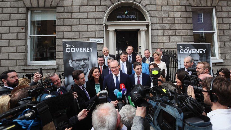 Housing Minister Simon Coveney (centre) addressed the media as he confirmed his candidacy for the Fine Gael leadership race